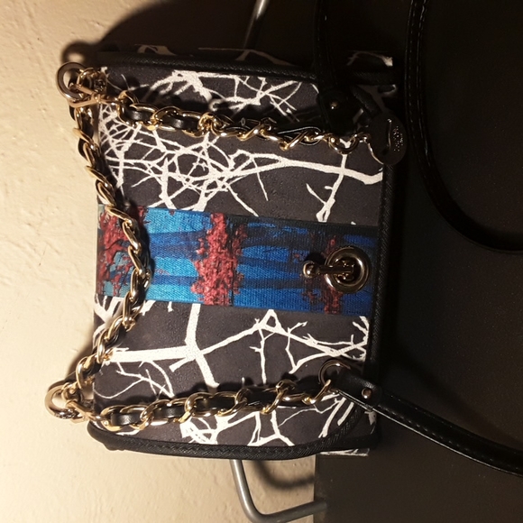 Ohmai Made in Italy Eco-Leather Reversible Clutch With Detachable Strap - Picture 2 of 5